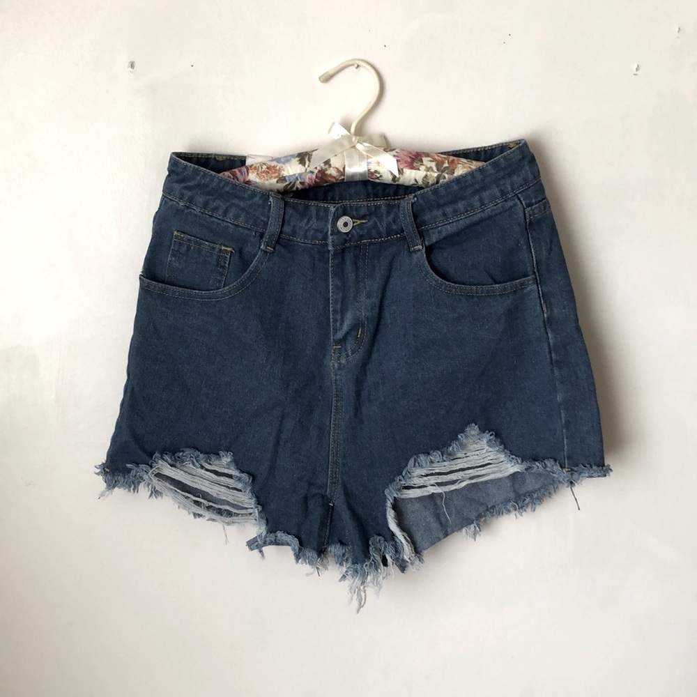 Distressed cut off jean shorts
